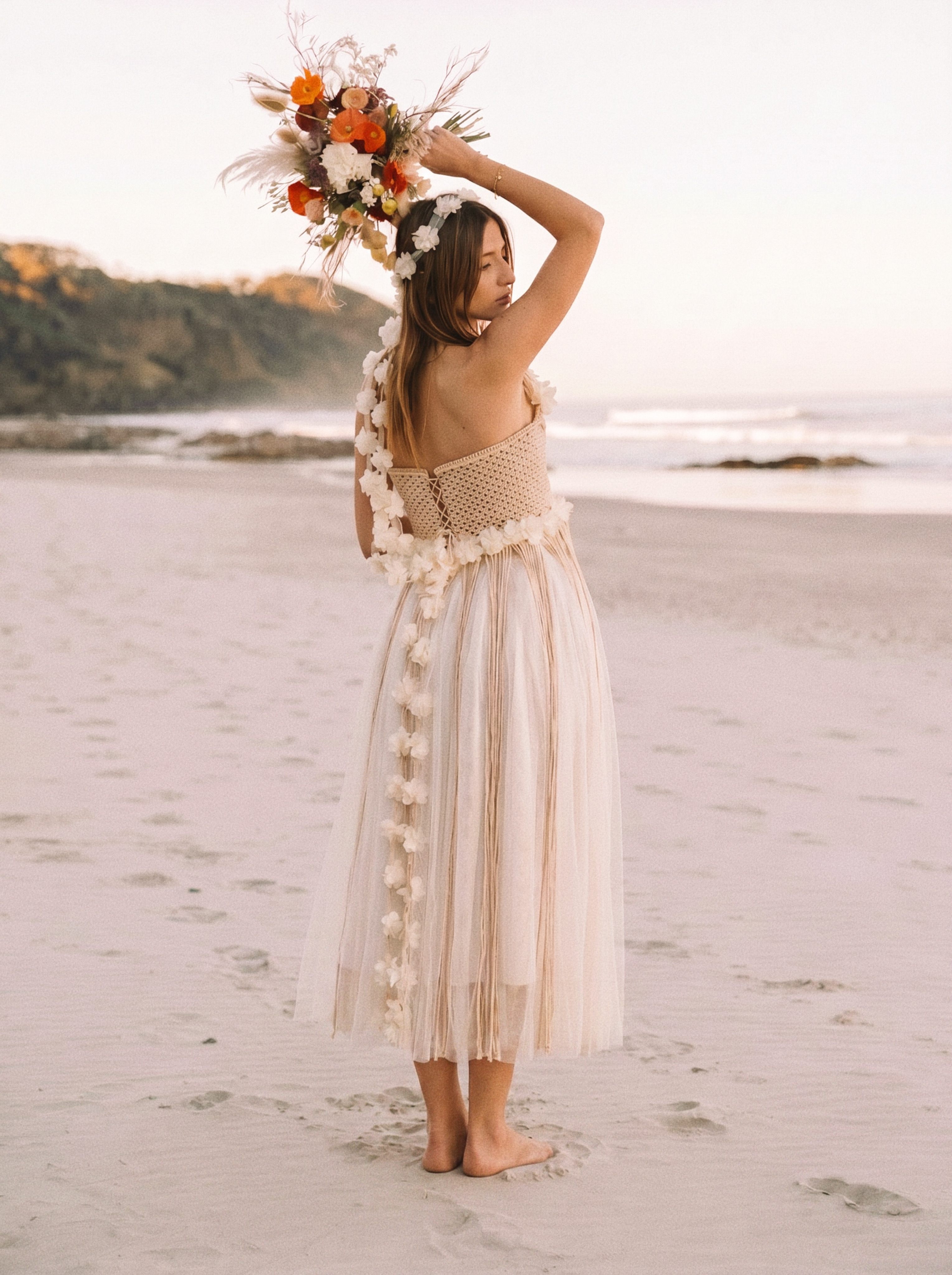Bohemian macramé wedding dress for coastal ceremony